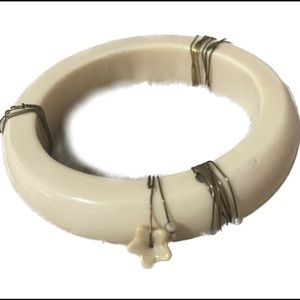 Cream Bakelite Bangle with Carved Flowers vintage